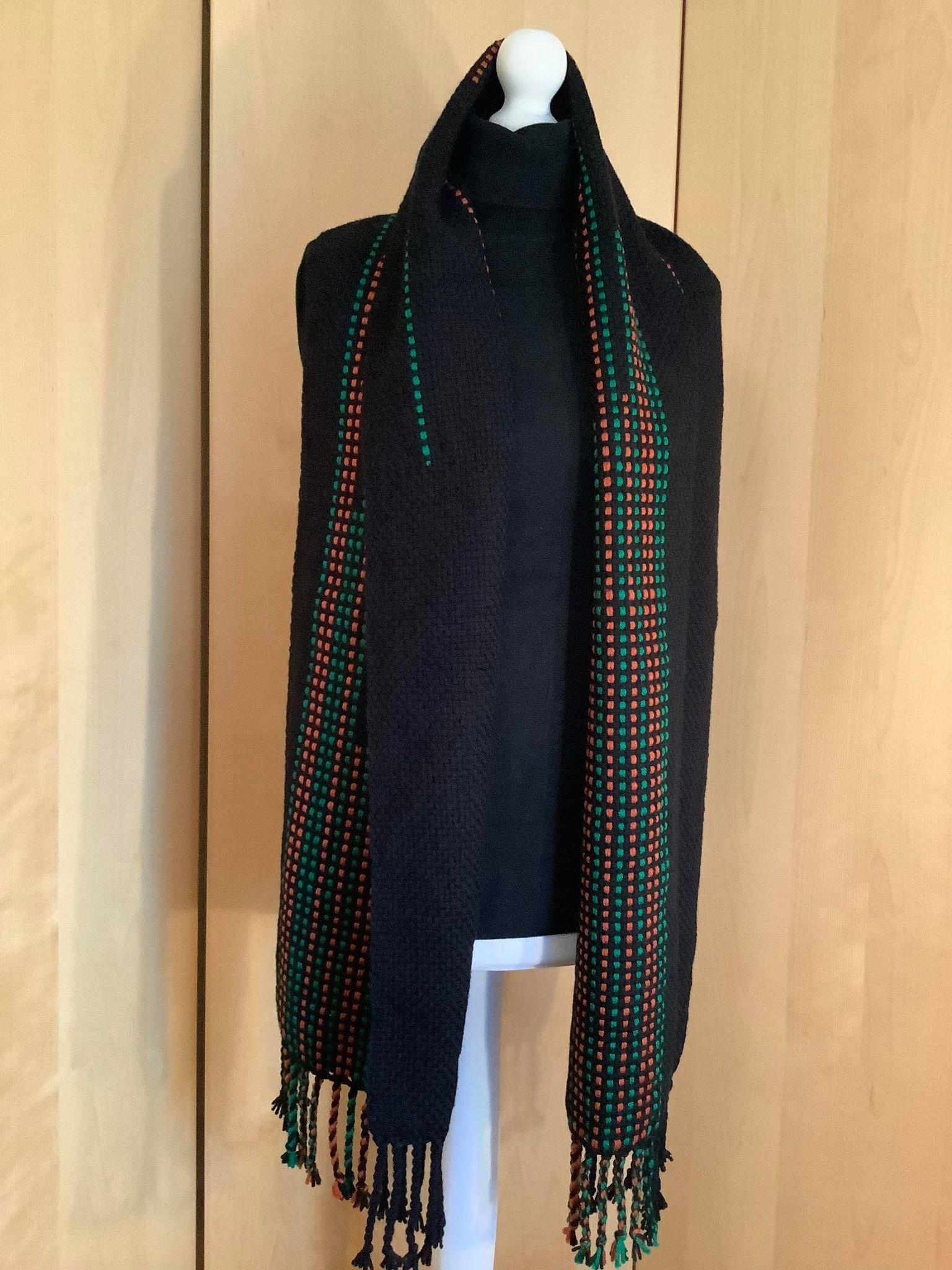 Scarf No2. Again kindly made by Robin Mackay with the OSBPG colours: This scarf is 186cm long plus two ends of 9cm tassels, which makes the total length of the scarf 204cm. The width is 34cm. It is made from 100% acrylic. further details on the night